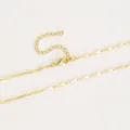 Detail of 18k gold plated melon seed chain with lobster clasp and extension on texture - 18K Gold Plated Melon Seed Chain