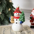 Festive Christmas snowman ornament wearing red hat and scarf holding a mini tree - Snowman with Pine Tree (7.4*4.8*12.5cm)