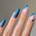 Glossy oval press-on nails featuring dark blue and nude pink wave contrast patterns - Bz1591 Blue Ice Water / Glue Type