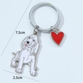 Dettaglio portachiavi cane con lunghezza totale di 7,5cm e ciondolo da 2,5cm - Cane Bianco/Basset Hound + Cuore