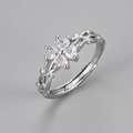 Detailed macro view of S925 silver four-leaf clover ring with vine band and zircon stones - Adjustable Open / Platinum Plated White Zirconia