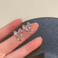 Silver bow stud earrings with pink heart zircon and hanging star pendant details - Bowknot Pink Rhinestone