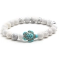 Elastic turtle bracelet with white turquoise beads and a teal turtle charm detail - White Turquoise (NL04-6)