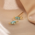 18K gold cartoon dinosaur stud earring featuring a marquise blue zircon on silk - Sky Blue