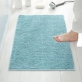 Blue rectangular chenille bath mat with grainy texture on white wood floor - Light Blue