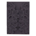 Macro detail of laser-cut black floral pattern on elegant wedding invitation cover - Black Khaki