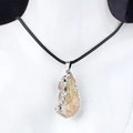 Irregular raw yellow crystal pendant necklace with silver edging on a black cord - Citrine (Silver)