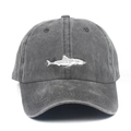 Close-up of a white shark embroidery on a dark grey washed denim baseball cap - One Size / Gray