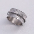 Silver vintage floral spinner ring with wide band and engraved relief pattern - US 7 / All Silver
