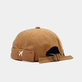 Detailed view of brown canvas miki hat featuring white airplane embroidery and metal buckle - Adjustable / Caramel color