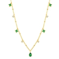 Detailed shot of emerald green teardrop pendant on golden chain with zircon accents - Gold Plated Emerald Zirconia Necklace