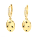 Detail of gold star drop earrings with micro-set white zircon and black gemstone stars - Black