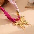 Macro view of 18K gold butterfly pendant with pink floral silk ribbon necklace strap - Scarf Butterfly Necklace (Random Scarf Color) (K806)