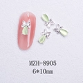Macro detail of butterfly nail charm with green cat eye stone and silver base 6x10mm - Silver Butterfly Light Green Cat Eye Style (8905)