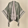 Detail of green and beige reversible knit shawl with horse patterns and striped trim - 130x150cm / Green Knight Pattern