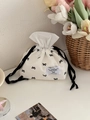 White canvas tissue pouch with black bow print and drawstring closure for home storage - Black