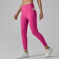 Detail view of high waist yoga leggings with functional side pocket for a smartphone - Dragon Fruit