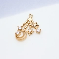 Macro detail of gold-plated star and moon pendant with shimmering cubic zirconia inlay - Style 02# Star Moon Meteor