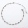 Detail view of 4.0mm silver chain bracelet with champagne gems and lobster clasp - Bracelet / Platinum / Champagne Zirconia