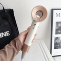 High-speed bladeless hair dryer in elegant white and rose gold finish with negative ions - Ceramic White