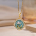 Vintage gouden ketting met blauwe emaille bloemhanger en parelmoer details - Blauw (A8)