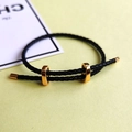 Adjustable black braided leather cord bracelet with square gold metal slide buckles - Black