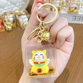 Acrylic lucky cat keychain with golden quicksand and Fortune charm pendant - Lucky Cat Family - Lucky Cat / Individual Packaging