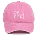 Detailed close-up of Be Kind heart embroidery on vintage washed pink cotton baseball cap - Pink