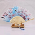 Japanese style folding fan with blue gradient floral pattern and blue tassel detail - White Ribs Style 10