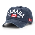 Close-up of CANADA embroidery and maple leaf flag on washed cotton baseball cap - Navy Blue