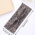 Elastic leopard print headband for women featuring a stylish twisted knot design - Leopard Cross Style E
