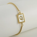 Gold plated snake chain bracelet with shell inlay rectangular pendant featuring letter Q - Letter Q
