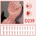 Long square press-on nails with nude pink base, red heart prints and rhinestone accents - Nude Pink Red Heart Scattered Rhinestones (D239)