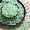 Light green bamboo shaped jade style glass beads piled in a black bowl for DIY - Light Green (Solid 6x12mm)