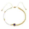 Adjustable stainless steel bead bracelet with a central blue zircon gemstone in gold finish - Blue