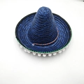 Detailansicht eines dunkelblauen mexikanischen Strohhuts mit bunten Bändern und weißen Pompons - L (58-60cm) / Durchmesser 35cm / Saphirblau
