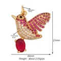 Golden bird pendant with pink and white cubic zirconia and a red oval drop stone - Bird on Branch-Gold