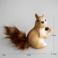 Realistic plush squirrel Christmas ornament holding a pinecone, size 15x11cm - Small Sitting Squirrel Figurines