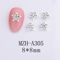 Macro view of 8x8mm silver star nail charms with sparkling rhinestones for manicure - Silver Solid Star White Stone (A305)