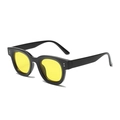 Retro thick black frame sunglasses with yellow lenses and silver rivets in 45-degree view - Black Frame Yellow Lens