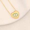 Detalle de collar de corazón dorado con ojo de esmalte verde sobre plato de cerámica - Estilo de ojo verde en forma de corazón(5#)