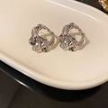 Macro shot of silver lava texture earrings on a minimalist cream ceramic tray - 7# Silver Needle-Silver-Lava Texture (Irregular)