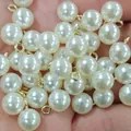 Colgante de perla ABS brillante con lazo dorado para diseño de joyas artesanales - Colgante de 12mm / Blanco Crema de Alto Brillo + Pasador de Ojo Dorado