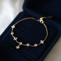 Elegant 18K gold plated 925 silver clover bracelet with zircons in a navy jewelry box - 925 Silver / 18K Gold
