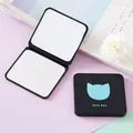 Portable square folding makeup mirror in matte black featuring a cyan cat love day design - Cat