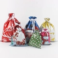 6-piece festive Christmas gift bag set with colorful Santa and snowman patterns - Set Two (3 of Each, 18 Total)