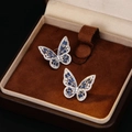 Exquisite butterfly stud earrings with blue trapezoid gems in a velvet jewelry box - Silver Blue
