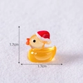 Miniature yellow resin duck wearing a red Santa hat for micro landscape decor, 1.7cm size - Orange