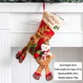 Large festive Christmas stocking with 3D reindeer and snowman hanging on a fireplace - Snowman Riding Reindeer Stocking with Bell