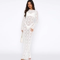 Detail of white floral lace maxi dress with long sleeves and elegant slim silhouette - S / Bottoms / White